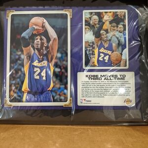 Basketball Memorabilia Display with Purple and Gold Accents
